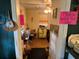 Hallway to living space with natural lighting and quirky decorations at 1268 Woodland Ne Rd, Conyers, GA 30012