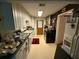 Kitchen with white cabinets at 1268 Woodland Ne Rd, Conyers, GA 30012
