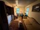 Bright living room features a sofa, laundry machine, and decorative rug at 1268 Woodland Ne Rd, Conyers, GA 30012