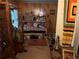 Cozy living room features wooden paneling, neutral carpet, and vintage cabinets at 1268 Woodland Ne Rd, Conyers, GA 30012