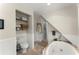 Bright bathroom with a soaking tub, glass enclosed shower, and tiled floors at 233 Spence Se Ave, Atlanta, GA 30317