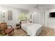 Relaxing bedroom with hardwood floors, a large window, and plenty of natural light at 233 Spence Se Ave, Atlanta, GA 30317