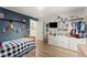 Bright bedroom with hardwood floors, plenty of storage space, and fun decor at 233 Spence Se Ave, Atlanta, GA 30317