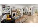 Cozy living room with a decorative fireplace, comfortable seating, and built-in shelving at 233 Spence Se Ave, Atlanta, GA 30317