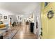 Bright, open-concept living room with beautiful hardwood floors and modern, neutral decor at 233 Spence Se Ave, Atlanta, GA 30317