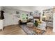 Comfortable living room with a fireplace, built-in shelving, and ample natural light at 233 Spence Se Ave, Atlanta, GA 30317