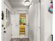 Mud room featuring tiled flooring, a window, and an exit door at 233 Spence Se Ave, Atlanta, GA 30317