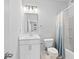 Bathroom features a vanity with cultured marble countertops, toilet, and shower with curtain at 3334 Swallowtail Ter, Duluth, GA 30096