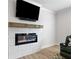 Elegant fireplace with a stone surround and a wooden mantle at 3334 Swallowtail Ter, Duluth, GA 30096