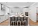 Modern kitchen with a center island, white cabinets, and stainless steel appliances at 3334 Swallowtail Ter, Duluth, GA 30096