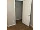 Bedroom with neutral walls, carpeted floors, and closet space at 5119 Hill Farm Ne Dr, Woodstock, GA 30188