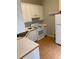 Functional kitchen featuring essential appliances and ample cabinet storage at 5119 Hill Farm Ne Dr, Woodstock, GA 30188
