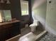 Bathroom featuring a stand up shower, toilet, and sink at 6649 Valley Hill Sw Dr, Mableton, GA 30126