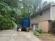 View of the house with a large truck parked in the driveway at 6649 Valley Hill Sw Dr, Mableton, GA 30126