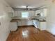 The kitchen features white cabinets and a window over the sink at 6649 Valley Hill Sw Dr, Mableton, GA 30126