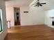 View of the living room with hardwood floors and a stone fireplace at 6649 Valley Hill Sw Dr, Mableton, GA 30126