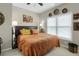 Comfortable bedroom featuring a cozy bed, soft lighting, and stylish decor for a relaxing ambiance at 185 Beracah Sw Walk, Atlanta, GA 30331