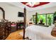 Elegant bedroom featuring a cozy bed, soft lighting, tasteful decor, and ample natural light at 185 Beracah Sw Walk, Atlanta, GA 30331