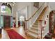 Open foyer with hardwood floors and staircase at 185 Beracah Sw Walk, Atlanta, GA 30331