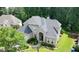 High aerial view of front yard and exterior facade plus two car garage at 185 Beracah Sw Walk, Atlanta, GA 30331