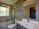 Bathroom with a shower/tub combination and a vanity with white countertop at 2116 Strasburg Ct, Atlanta, GA 30338