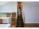 Inviting entryway with a contemporary staircase and hardwood flooring at 2116 Strasburg Ct, Atlanta, GA 30338