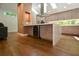 Modern kitchen features stainless steel appliances, center island with wine cooler, and plenty of natural light from the skylights at 2116 Strasburg Ct, Atlanta, GA 30338