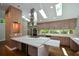 Spacious kitchen with a large island, stainless steel appliances, and wood cabinets at 2116 Strasburg Ct, Atlanta, GA 30338