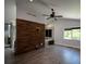 Bright main bedroom suite boasting wood-look flooring, vaulted ceilings, and a luxurious bathroom with a soaking tub at 2116 Strasburg Ct, Atlanta, GA 30338
