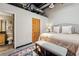 Bright bedroom featuring a comfortable bed, closet, and ensuite bathroom at 5200 Peachtree Rd # 3420, Atlanta, GA 30341