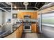 Modern kitchen with stainless steel appliances, granite countertops, and maple wood cabinets at 5200 Peachtree Rd # 3420, Atlanta, GA 30341