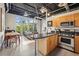 Open concept living area with kitchen featuring stainless steel appliances and lots of light at 5200 Peachtree Rd # 3420, Atlanta, GA 30341