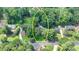 Expansive treed lot with beautiful foliage on a quiet street offers privacy at 5285 Bannergate Dr, Johns Creek, GA 30022