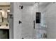 Sleek bathroom showcases a glass-enclosed shower with modern fixtures and stylish tile at 5285 Bannergate Dr, Johns Creek, GA 30022