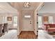 Bright foyer with hardwood floors, leading to a dining room and living room, perfect for entertaining at 5285 Bannergate Dr, Johns Creek, GA 30022