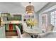 Charming breakfast nook featuring a round table with chairs, and plenty of natural light at 5285 Bannergate Dr, Johns Creek, GA 30022