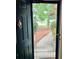 View through the front door of a well-lit entryway and walkway at 1003 River Plantation Dr, Woodstock, GA 30188
