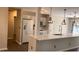 Bright kitchen featuring white cabinets, stainless appliances, and a spacious island at 1003 River Plantation Dr, Woodstock, GA 30188