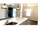 Bright kitchen featuring quartz countertops and stainless steel faucet at 1003 River Plantation Dr, Woodstock, GA 30188