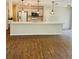 Modern kitchen with a large island, white cabinets, stainless steel appliances, and open layout at 1003 River Plantation Dr, Woodstock, GA 30188