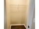 Empty walk-in closet with wire shelving, offering ample storage space and organization at 1003 River Plantation Dr, Woodstock, GA 30188