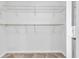 Empty walk-in closet with adjustable wire shelving, ready for all your storage needs at 1138 School Side Dr, Lithonia, GA 30058