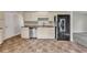 The kitchen features stainless steel appliances and laminate countertops at 1138 School Side Dr, Lithonia, GA 30058