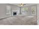 Bright living room with fireplace and large windows at 1138 School Side Dr, Lithonia, GA 30058