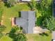 Bird's-eye view of the home, showing the roof, back deck, and surrounding greenery at 3274 Ridgecrest Se Rd, Smyrna, GA 30080