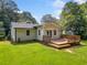 Beautiful backyard featuring a wood deck and lush green grass at 3274 Ridgecrest Se Rd, Smyrna, GA 30080