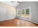 Bedroom with hardwood floors and access to a deck at 3274 Ridgecrest Se Rd, Smyrna, GA 30080