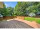 Wood deck overlooking the lush, green backyard at 3274 Ridgecrest Se Rd, Smyrna, GA 30080