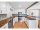 Beautiful renovated kitchen featuring butcher block countertops and stainless steel appliances at 3274 Ridgecrest Se Rd, Smyrna, GA 30080