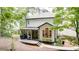 Charming backyard with a deck, patio, and lush greenery at 3290 Cherry Oak Ln, Cumming, GA 30041